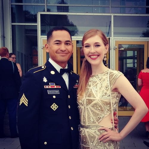 Crisostomo and his fiancée posed in formal clothing -- Crisostomo in his formal military uniform and Lindsey in a white-gold dress.